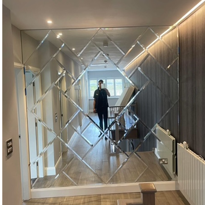 Diamond pattern mirror feature wall hallway